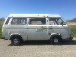 A VW T3 Campervan called Chas-0321 and Chas enjoying the sunshine for hire in Brentford, London