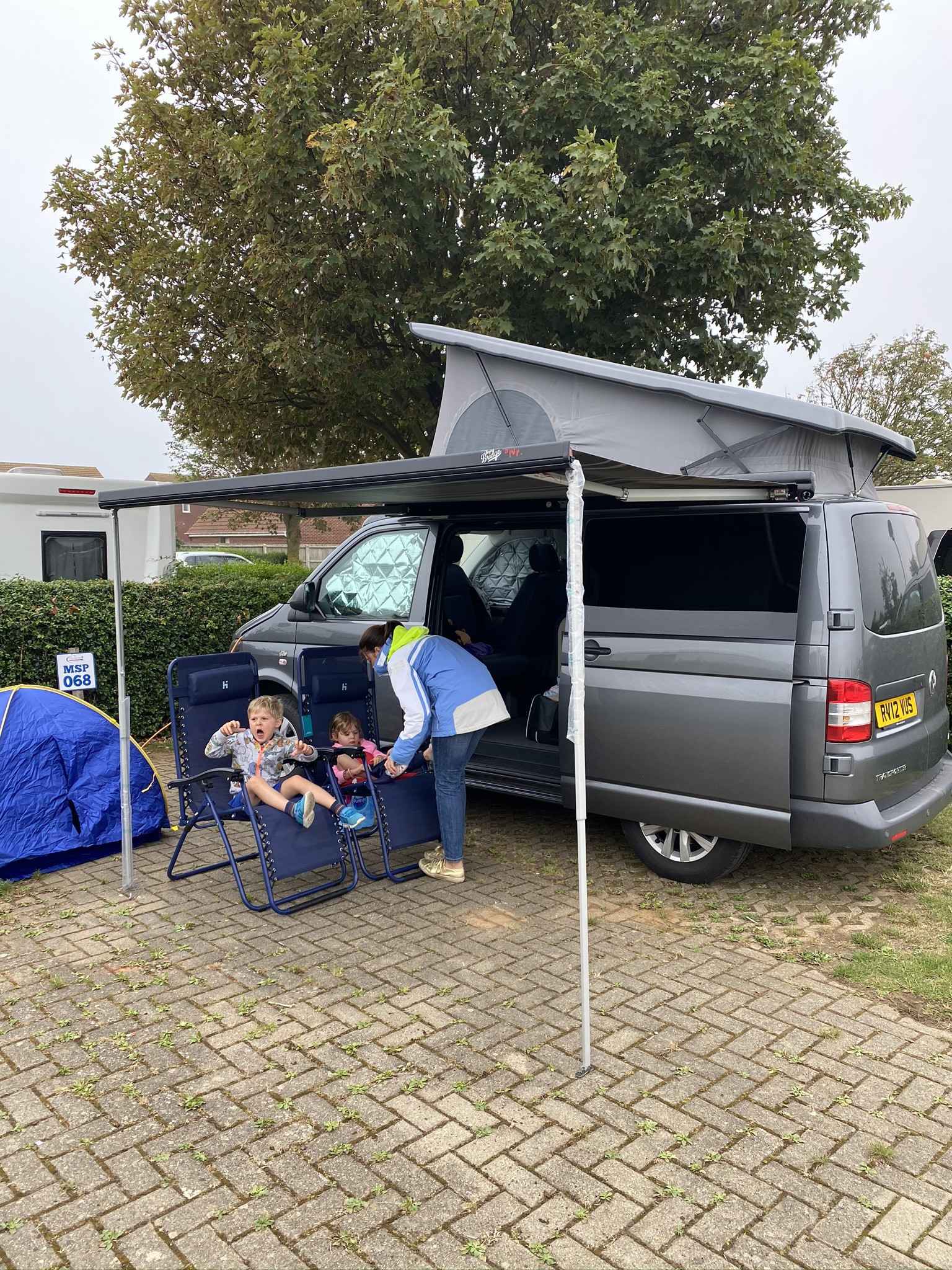 A VW T5 Campervan called Dougie and Great awning to keep out the rain! for hire in Romford, Essex