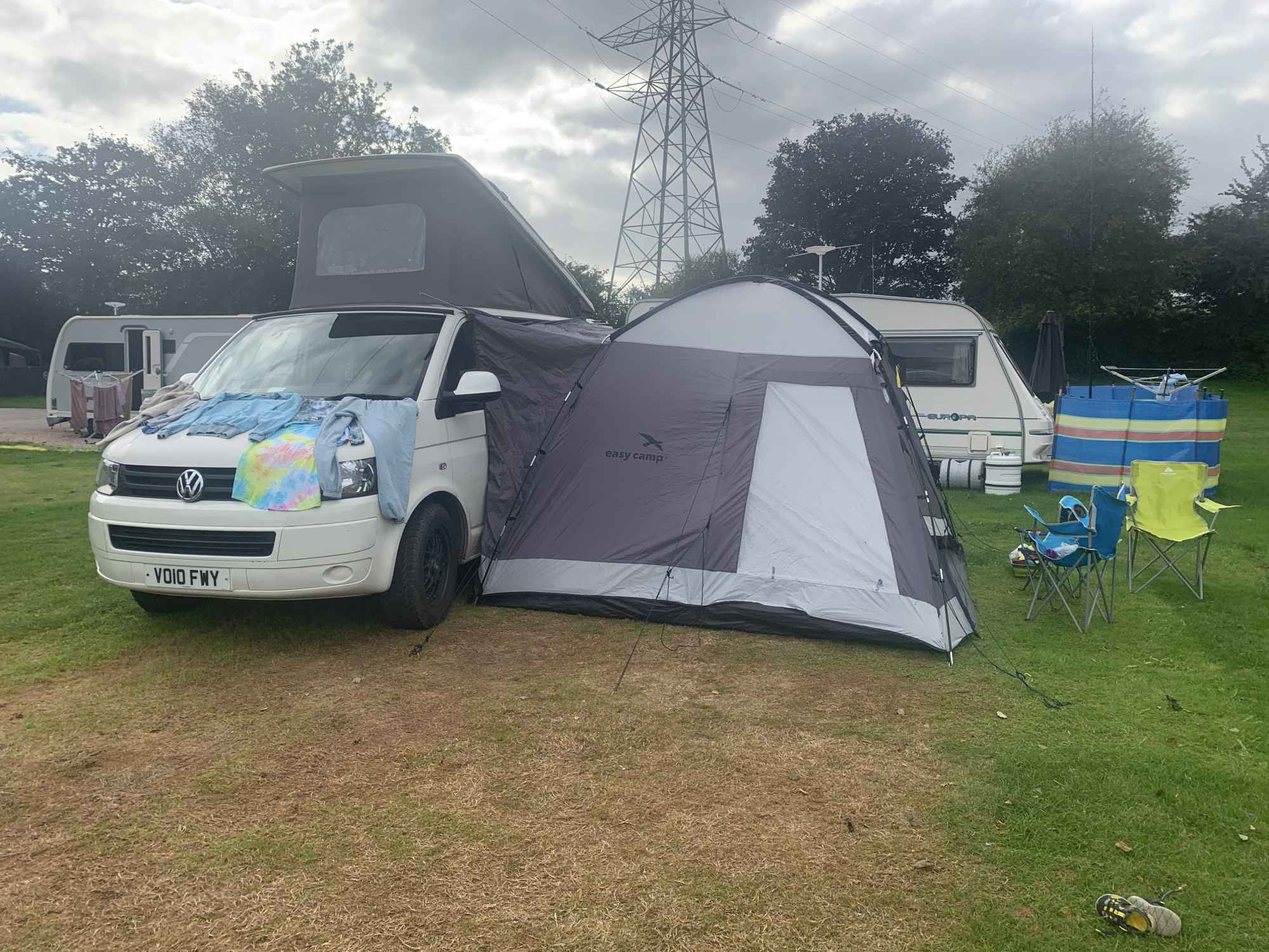 A VW T5 Campervan called SnowBall and We attached a magnetic awning to Snowball for some extra space which was ideal with a toddler for hire 