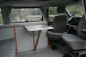 A VW T4 California Campervan called VwWestfalia and The interior with good looking and comfy seats for hire in Sheffield, South Yorkshire
