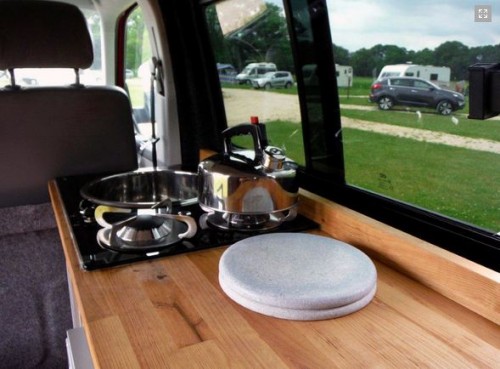 A VW T5 Campervan called Bodhi and The van's interior view for hire in Windsor, Berkshire