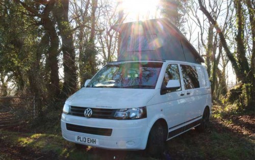 A VW T5 Campervan called Bertram and Bertram in the woods for hire in North Tawton, Devon