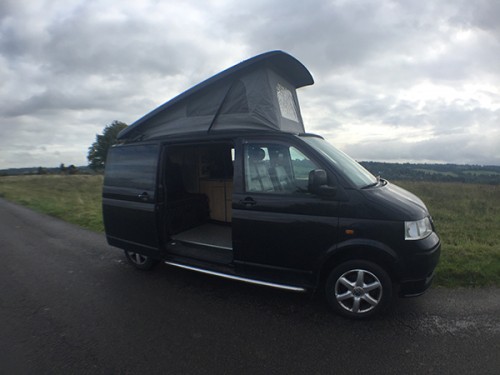 A VW T5 Campervan called Axle and Axle with Pop top for hire in Coulsdon, London