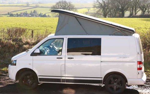 A VW T5 Campervan called Bertha and Side View for hire in North Tawton, Devon
