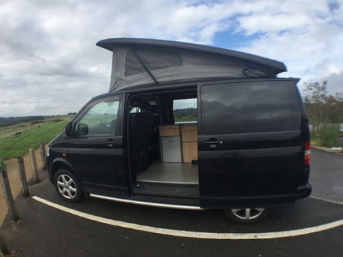 A VW T5 Campervan called Axle and Side View for hire in Coulsdon, London