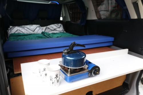 A Toyota Campervan called Alphard and Hob on the rear work surface for hire in London, London