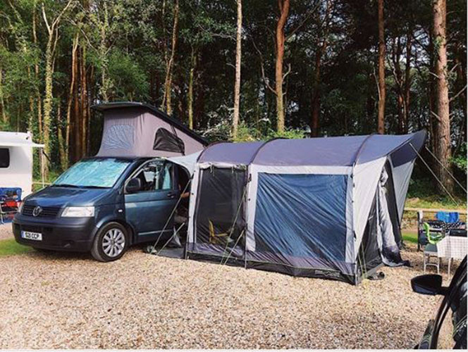 A VW T5 Campervan called rosie and 2 berth Outwell side awning for additional shelter, space, storage and to sleep more guests available on request (additional fees apply) for hire in South Croydon, Surrey
