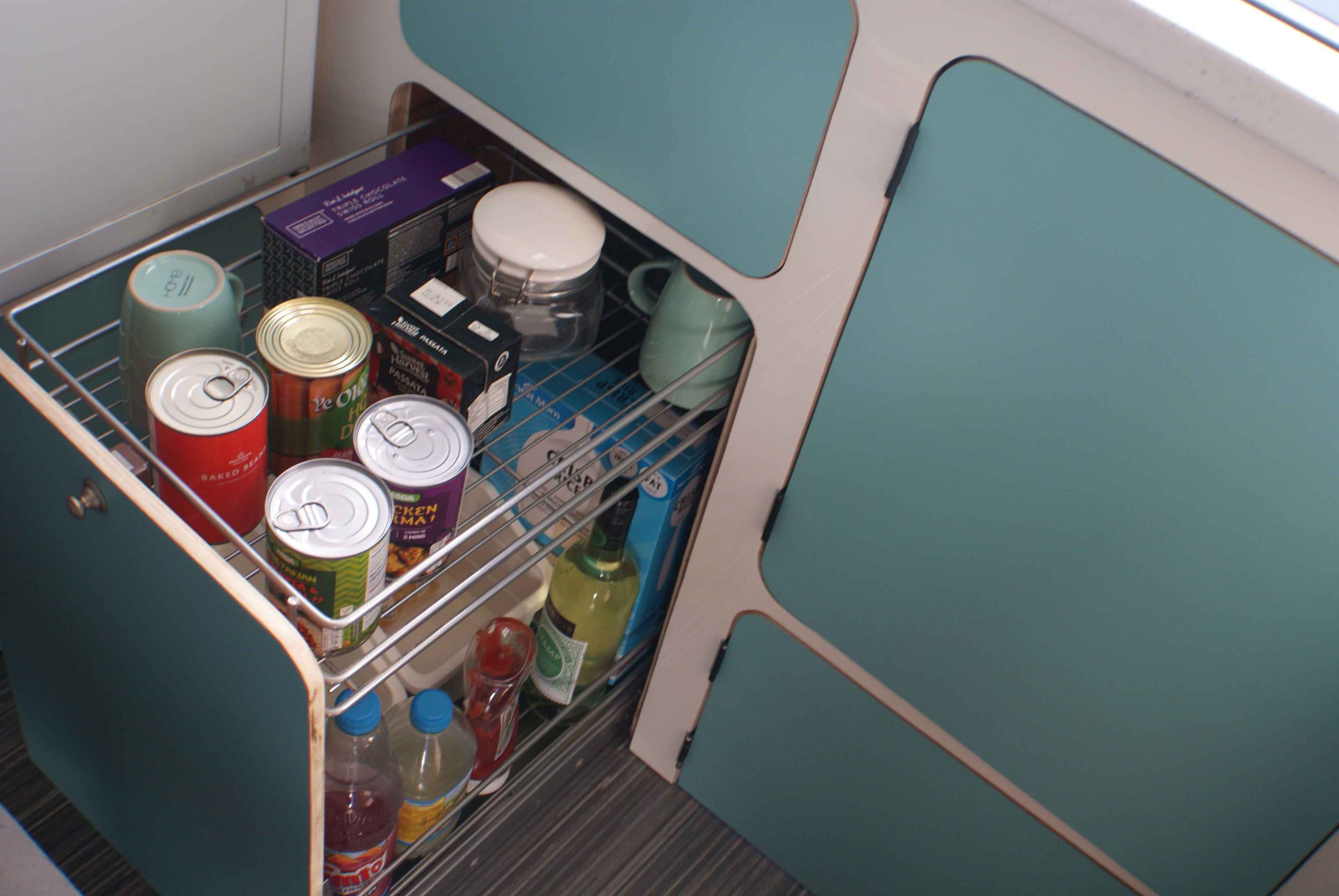 A Nissan Campervan called Molly and Deep 2 shelf pull out food storage - everything can have a home for hire in Ledbury, Gloucestershire