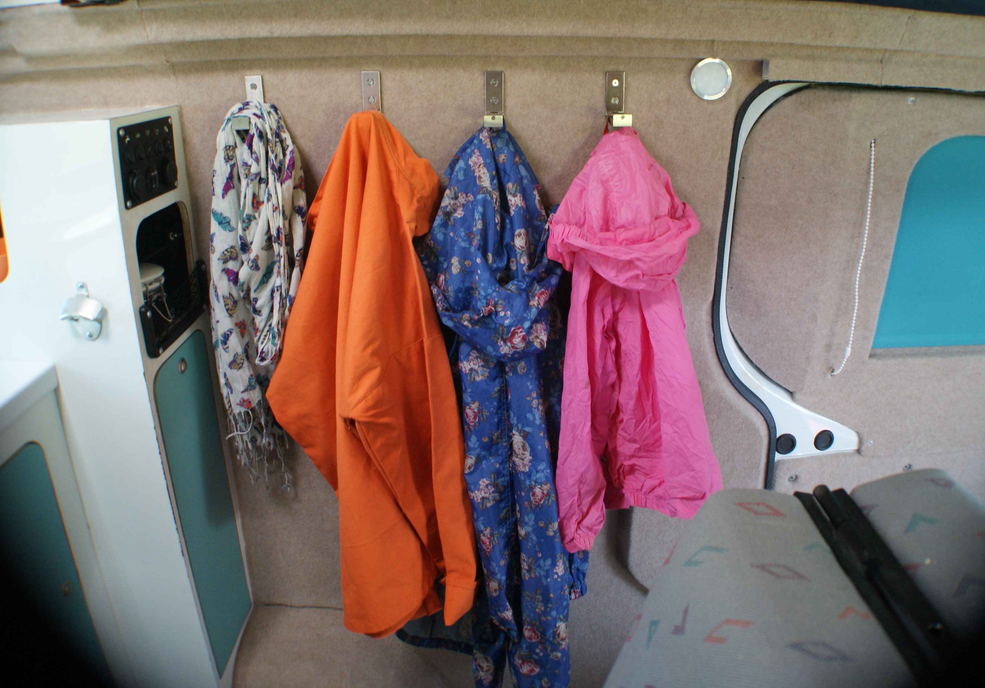 A Nissan Campervan called Molly and 4 folding coat hooks for quick easy access and storage for hire in Ledbury, Gloucestershire