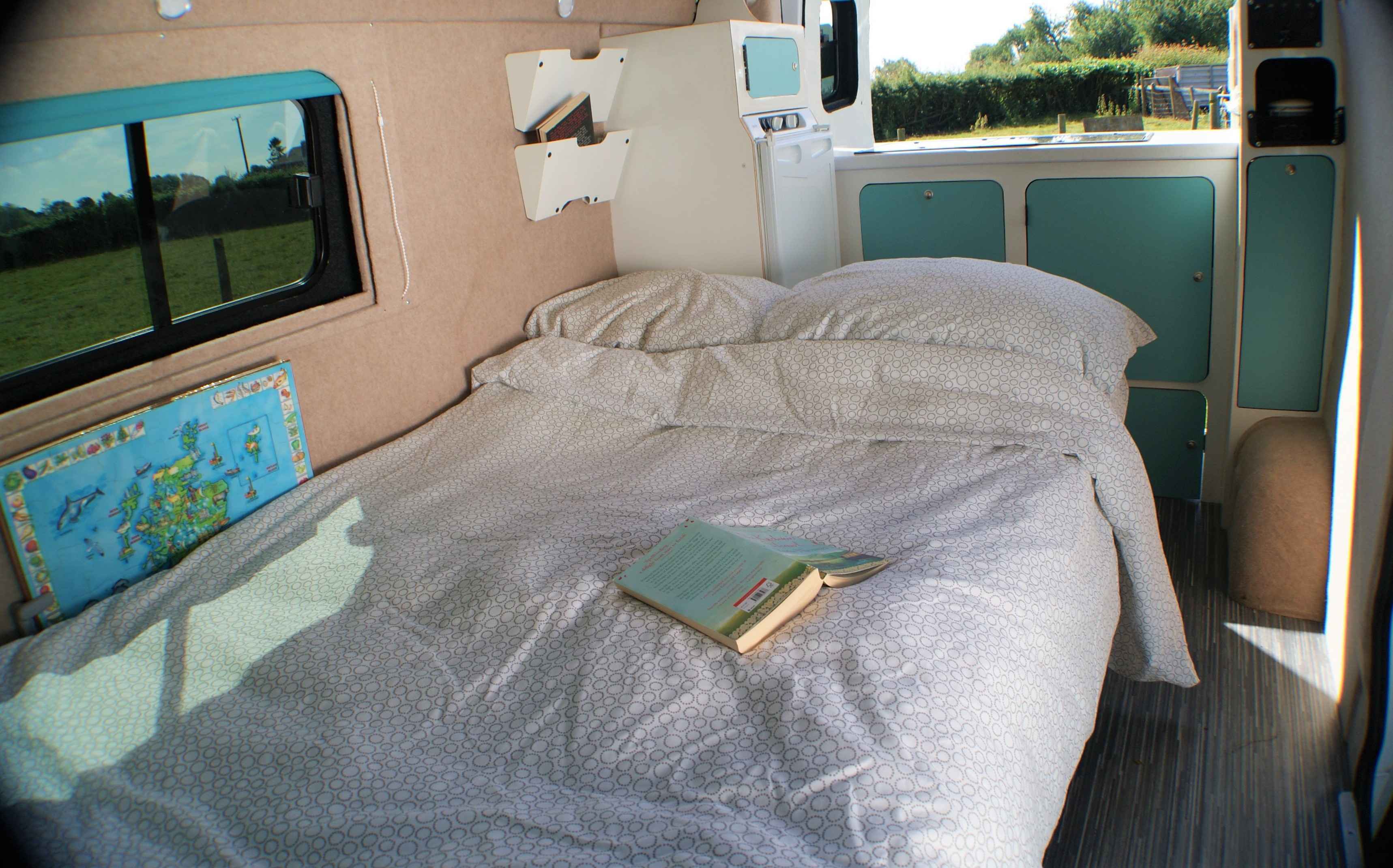 A Nissan Campervan called Molly and Comfy double with easy glide mechanism - from sitting to sleeping in a couple of minutes for hire in Ledbury, Gloucestershire