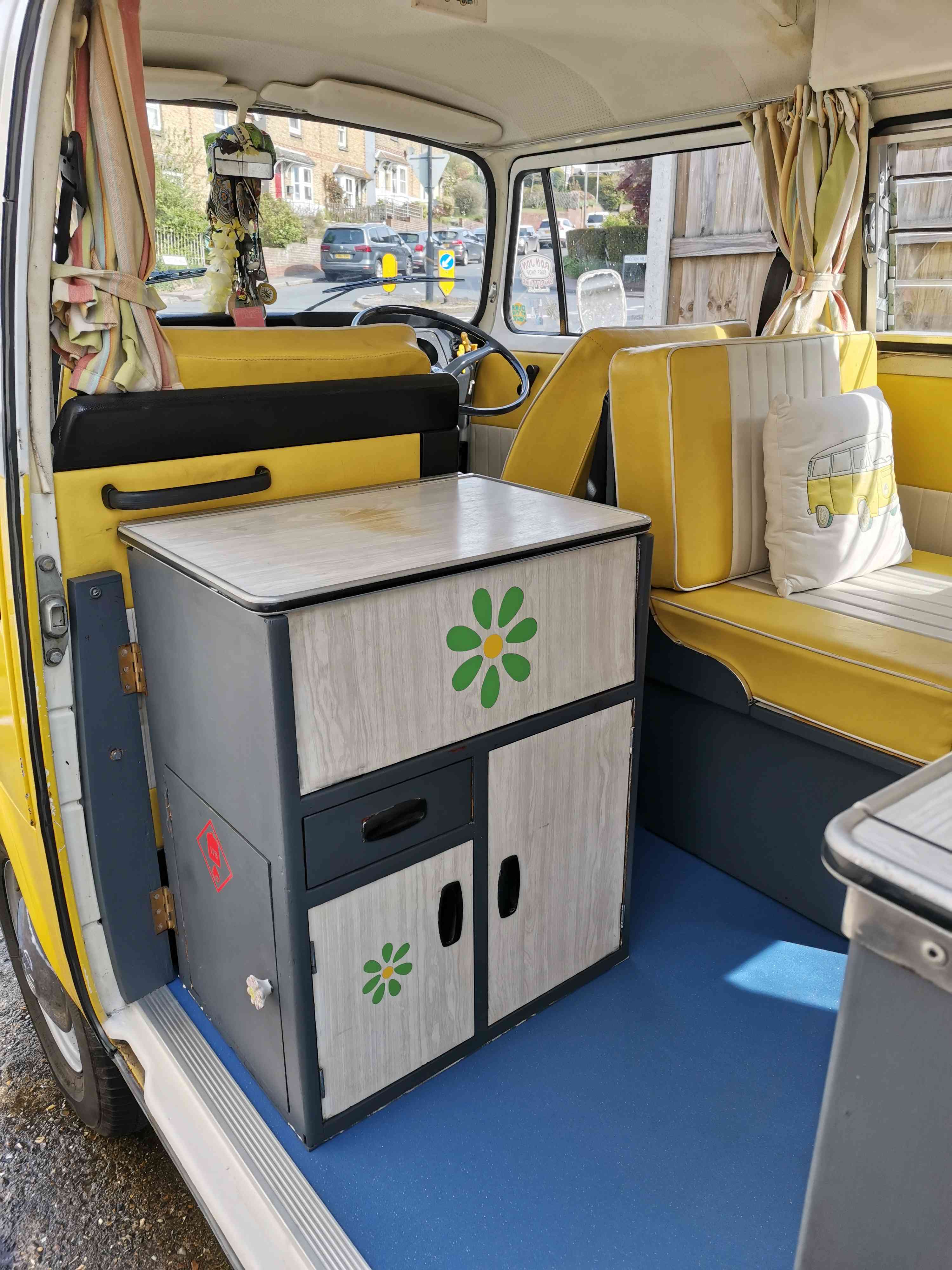 A VW T2 Classic Campervan called Haroldinho and Gas stove hidden nicely for hire in Preston, Canterbury, Kent