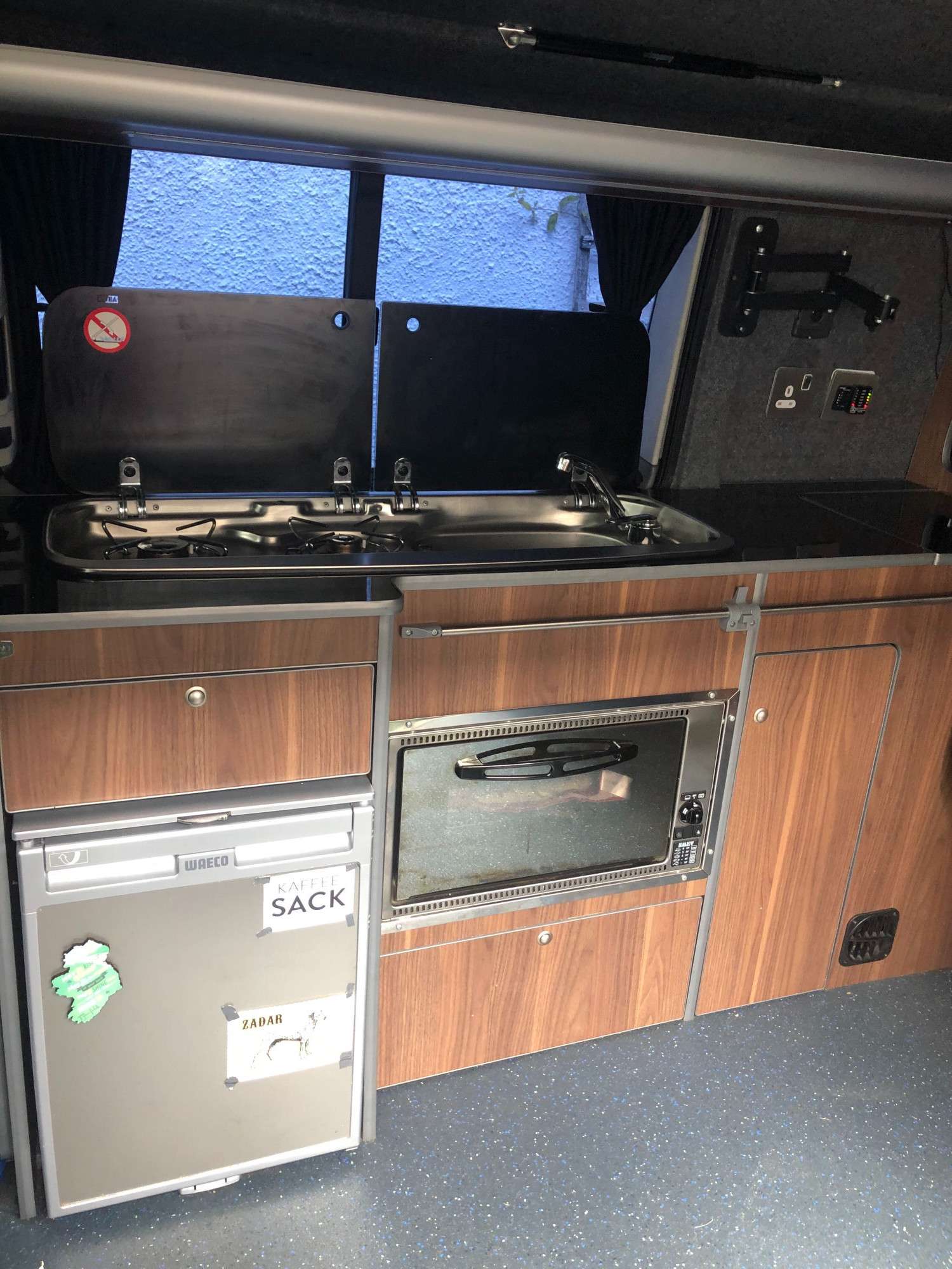 A VW T5 Campervan called Herve and Gas hob, ovan and grill electric fridge, sink with electric pump tap. for hire in Gifford, East Lothian