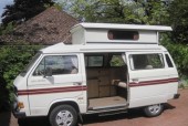 A VW T3 Campervan called Dormi and 6 Side view with roof up 1 for hire in Bracknell, Berkshire