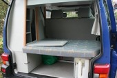 There is just enough space for storage under the chairs.