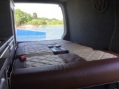 A VW T5 Campervan called Indy and lake view for hire in Staines, Surrey