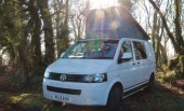 A VW T5 Campervan called Bertram and Bertram in the woods for hire in North Tawton, Devon