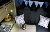 A VW T5 Campervan called Bertram and Bertram rear seats for hire in North Tawton, Devon