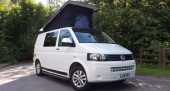 A VW T6 Campervan called Spud and Spud showing his pop top for hire in Halifax, West Yorkshire