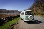 A VW T2 Classic Campervan called Enlli and Bessie by Llyn Dinas in Snowdonia for hire in Garndolbenmaen, Gwynedd