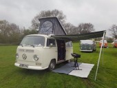 A VW T2 Classic Campervan called Misty2 and Misty with his integrated Wind Out Awning extended for hire in Eltham, SE9, London