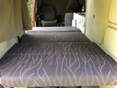 Folding down into main bed
