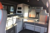 A VW T5 Campervan called ClockworkOrange and Seating & Dinette for hire in Chelmsford, Essex