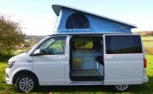 A VW T6 Campervan called Edi and Edi roof up for hire in Watford, Hertfordshire