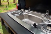 Sink with water tank and pump