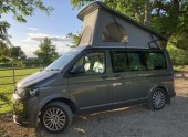 A VW T5 Campervan called Bubba and Bubba on the outside for hire in Surrey, Surrey