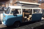 A VW T2 Classic Campervan called Penny and Roof up and sliding door open for hire in York, North Yorkshire