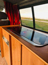 A VW T4 Campervan called Edna and Internal view of sink and cooker area for hire in East Sussex, East Sussex
