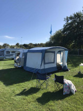 A VW T2 Brazilian campervan called Mabel and Awning on display for hire in Arundel, West Sussex