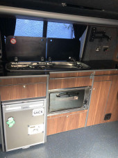 A VW T5 Campervan called Herve and Gas hob, ovan and grill electric fridge, sink with electric pump tap. for hire in Gifford, East Lothian