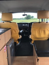 A VW T2 Brazilian Campervan called Roobarb and View from the bench seat for hire in Malpas, Cheshire