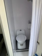 Cassette toilet in shower room.
