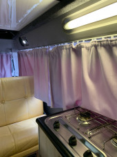 A VW T2 Brazilian Campervan called Roobarb and Looking back from driver's seat for hire in Malpas, Cheshire