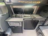 A VW T4 Campervan called Bettie and Two ring hob and sink with eternal pipe. and Grey water pipe. for hire in London, Isle of Wight