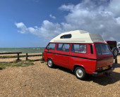 A VW T3 Campervan called Tiki-Red and for hire in Portsmouth, Hampshire